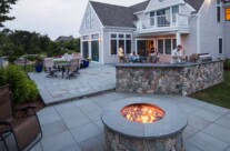 Outdoor kitchen at its best – in use during a cape cod summer evening
